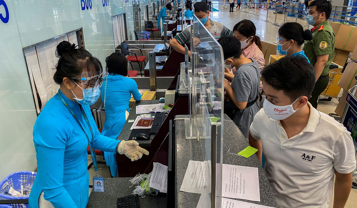 Passengers wearing protective face masks in Vietnam